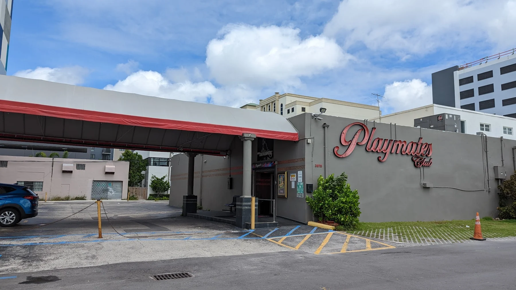 The exterior and entrance of Playmates Club